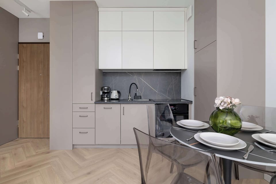 The fully equipped kitchenette includes everything you need for a home-cooked meal.