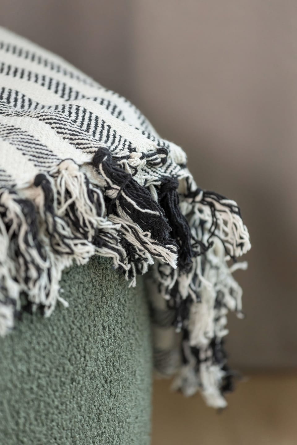The arrangement in beige and wood that creates a warm and inviting atmosphere.