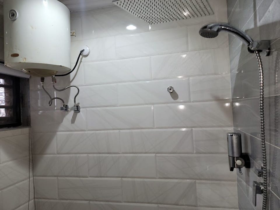 Deluxe Apartment, Non Smoking, City View | Bathroom | Shower, towels, soap, shampoo