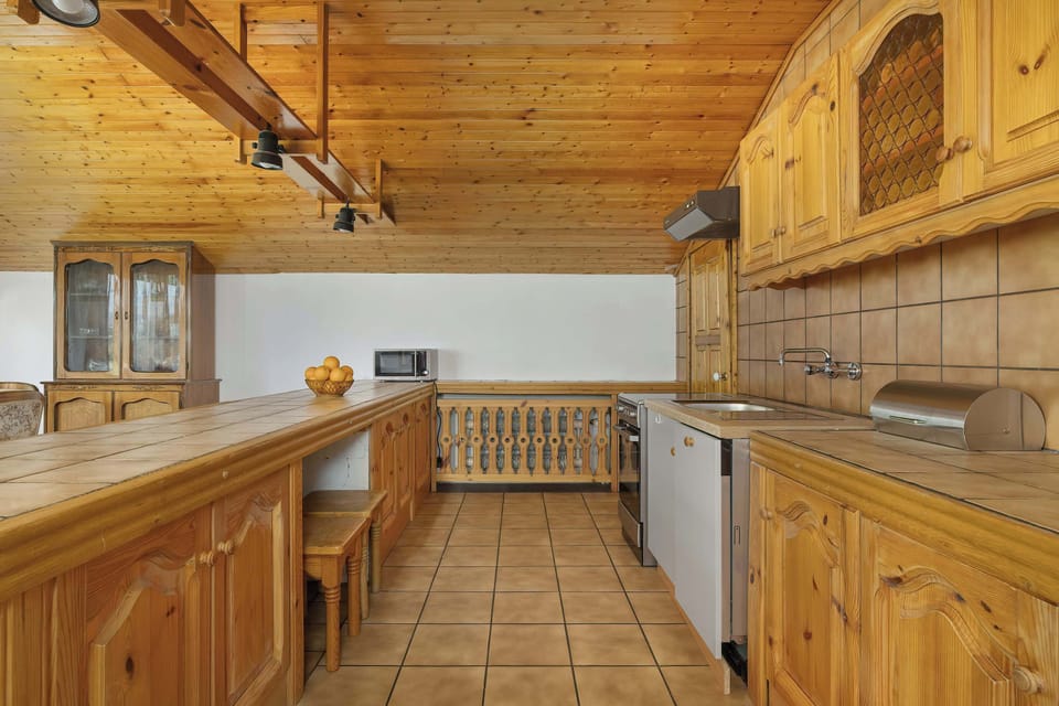 Functional kitchen with appliances.