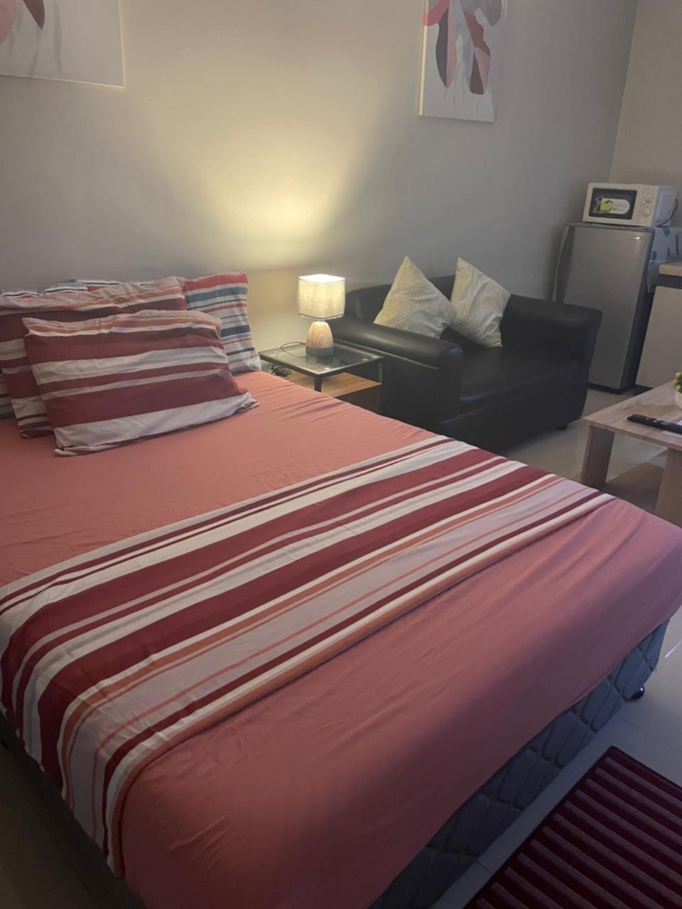 Comfort Studio, 1 Queen Bed with Sofa bed, Balcony, City View | Living area | 49-inch Smart TV with digital channels