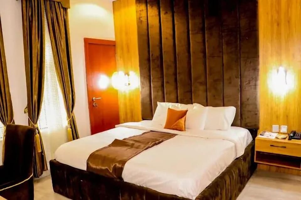 Deluxe Room, Balcony, City View | Desk, laptop workspace, blackout drapes, soundproofing