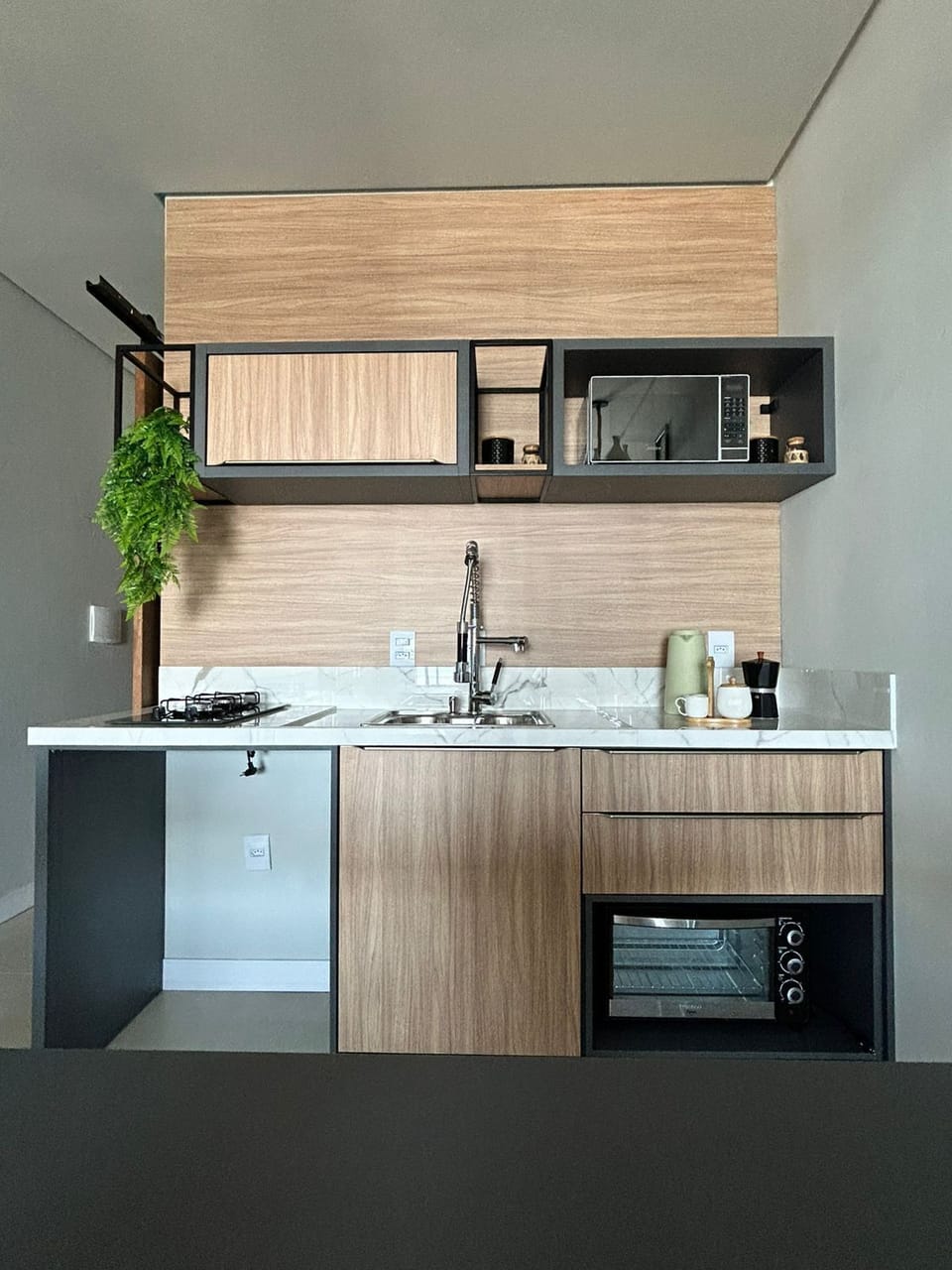Mini-fridge, microwave, stovetop, cookware/dishes/utensils