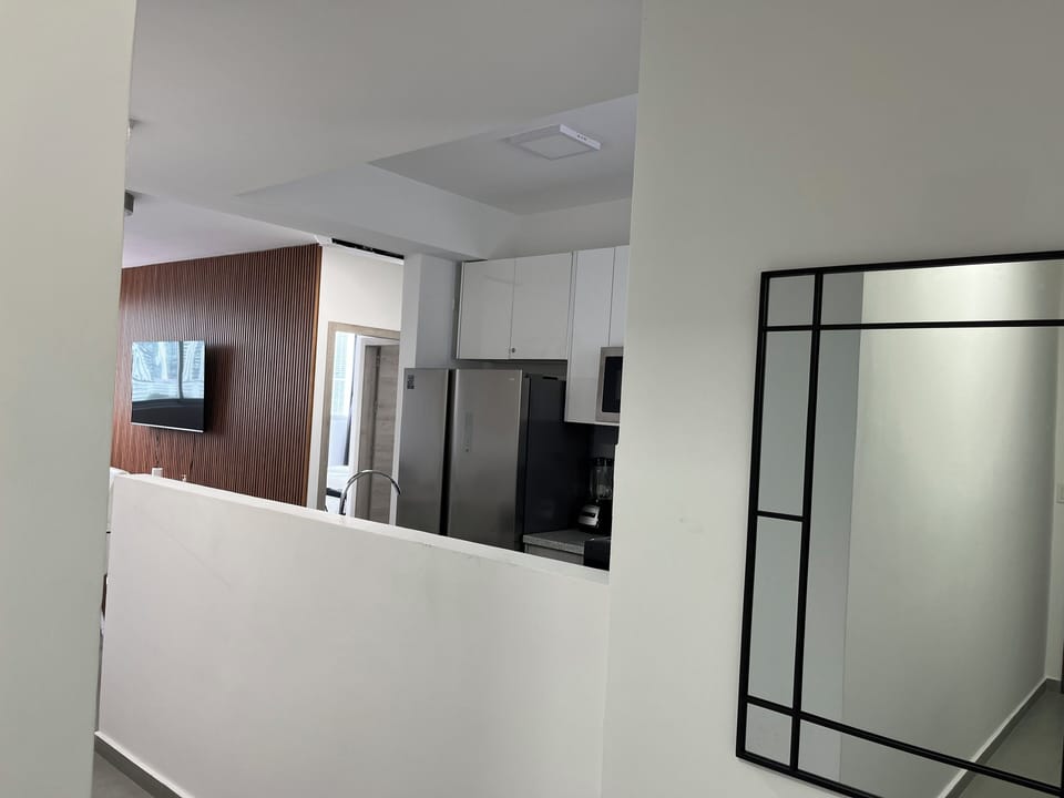Luxury Condo, Ocean View (103) | Living area | 126-cm TV with cable channels