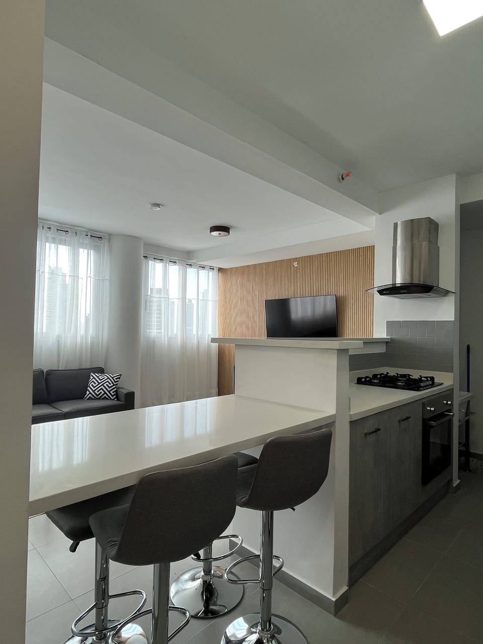 Signature Condo, Ocean View (109) | Living area | 126-cm TV with cable channels