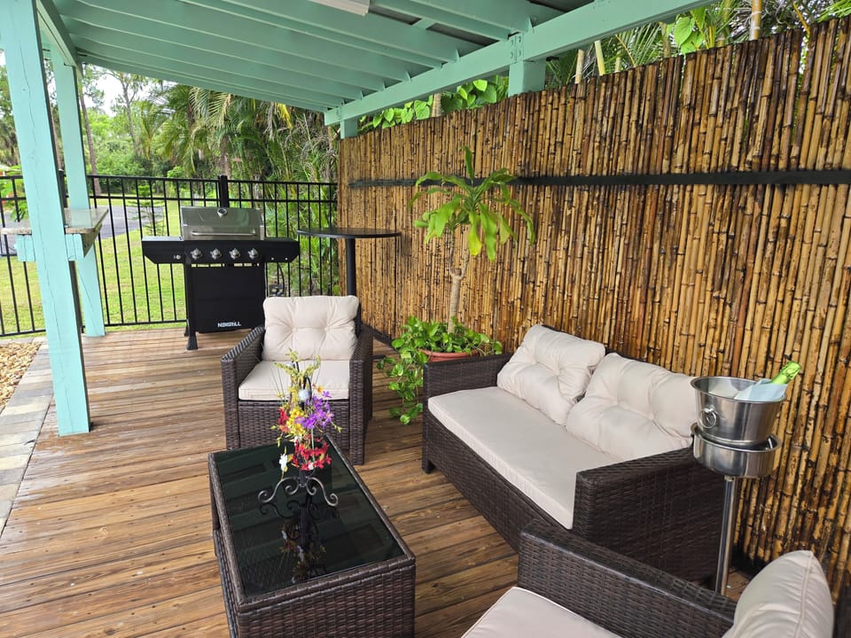 barbecue area in front of the pool 