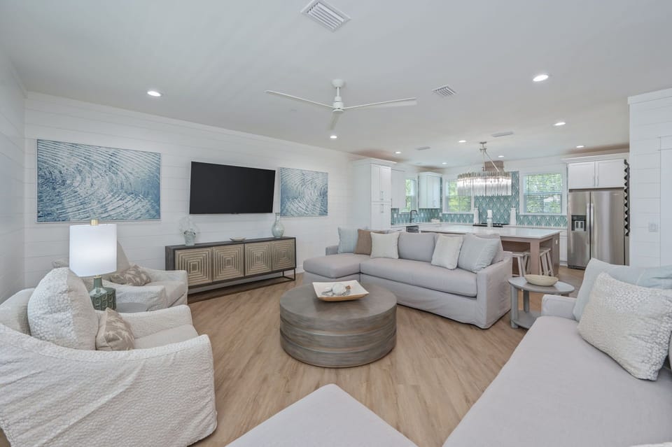 Three living room areas give plenty of space for the whole family to relax!