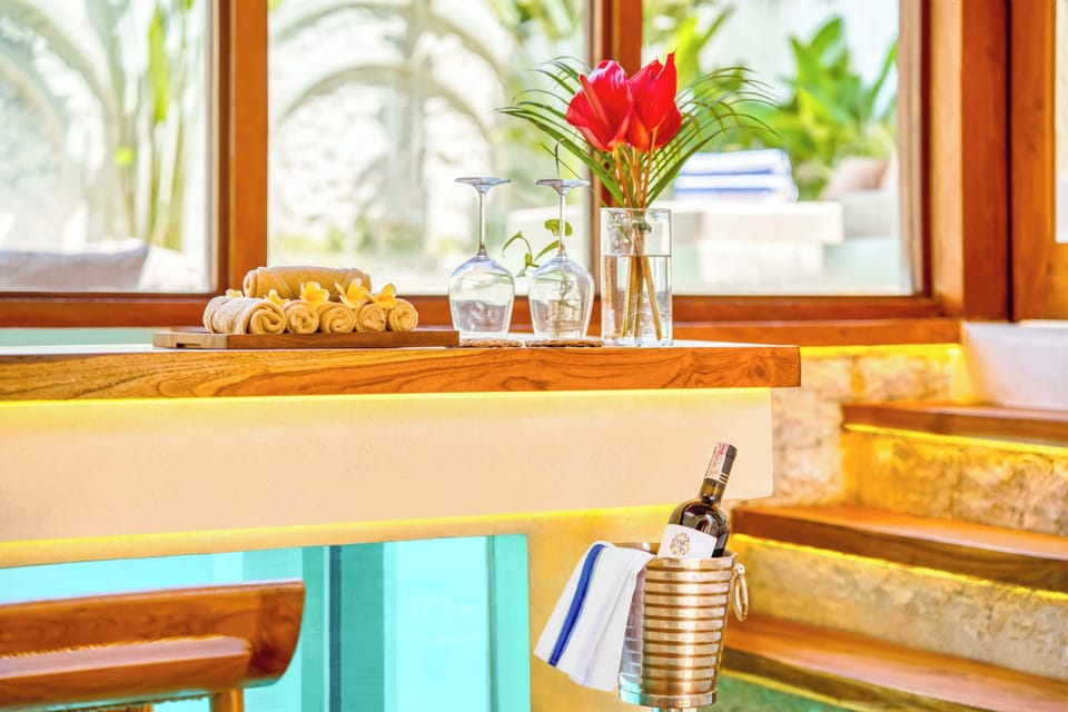 Enjoy a glass of wine in style, surrounded by thoughtful details and serene luxury