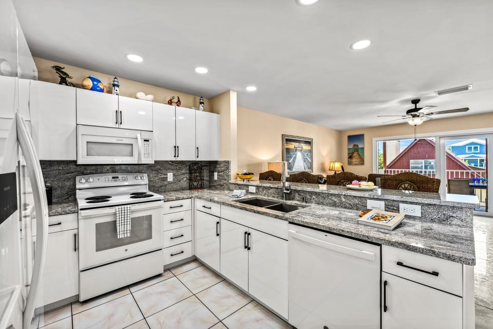 Dishwasher, stove, microwave & essentials included.