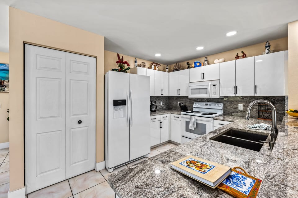 Bright kitchen stocked for vacation cooking.
