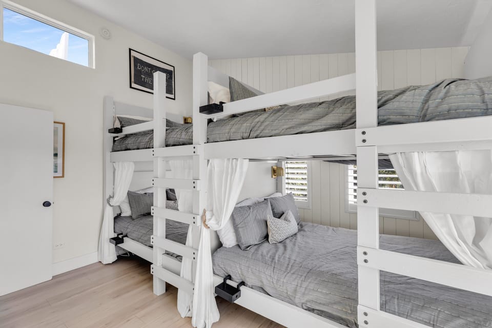 There are 2 bunk beds with 4 full over full sized beds