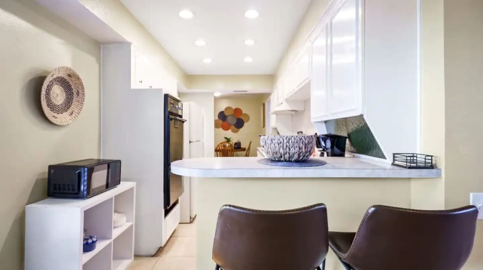 Bar area seating adjacent to open living room for amazing conversations 