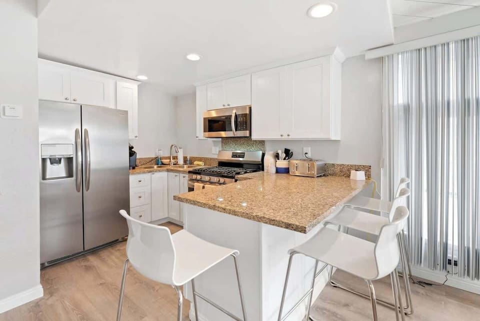 Kitchen is located right as you enter the home.  It has all kitchen essentials needed for a comfortable stay. 
Keurig Coffee machine and coffee provided. 