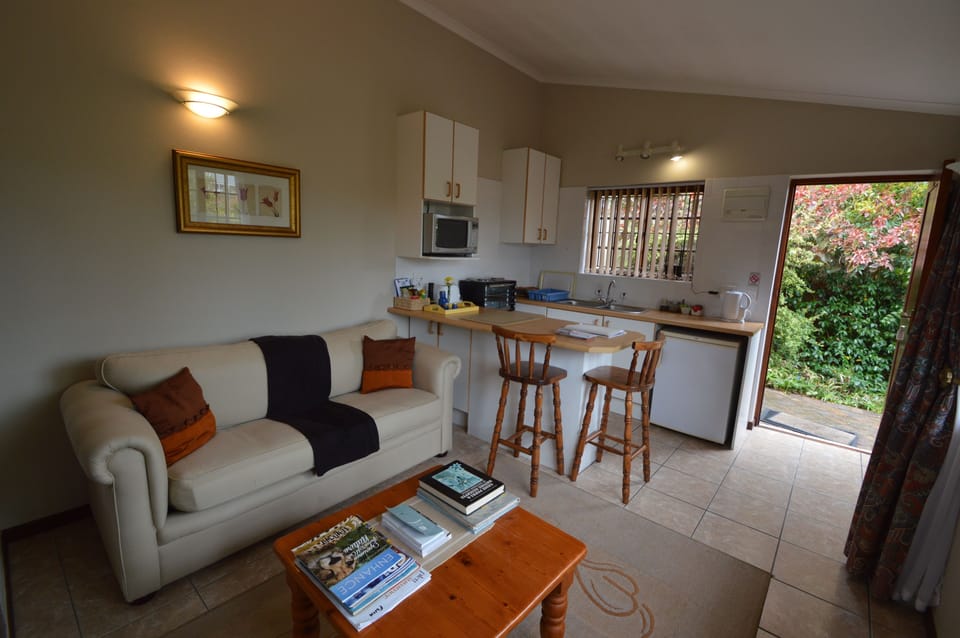 Cottage (Finch cottage + self catering) | Living area | 32-inch flat-screen TV with satellite channels, TV, heated floors