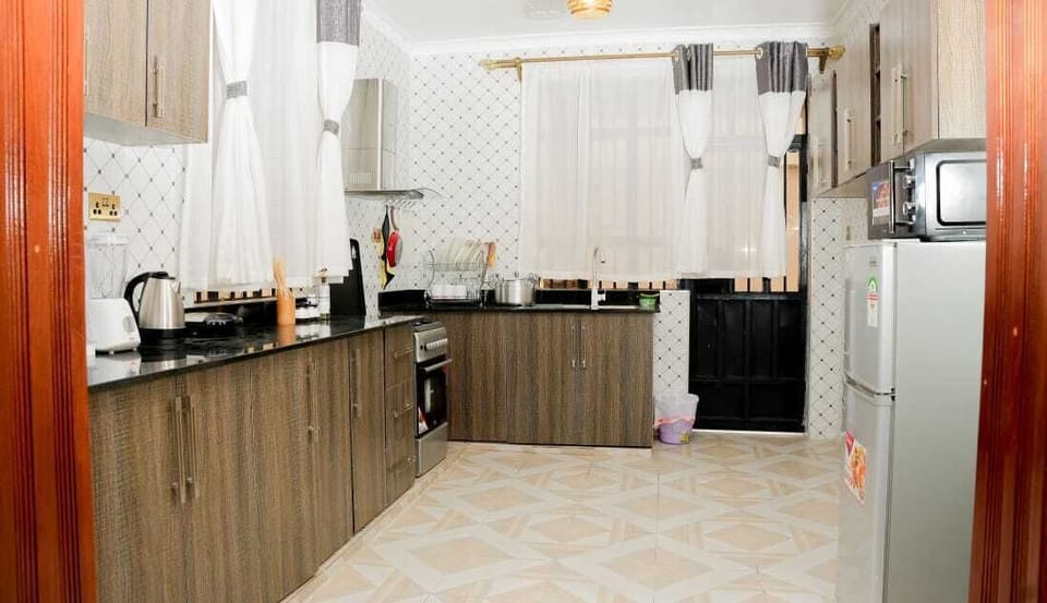 Family Apartment, City View | Private kitchen | Fridge, microwave, cookware/dishes/utensils