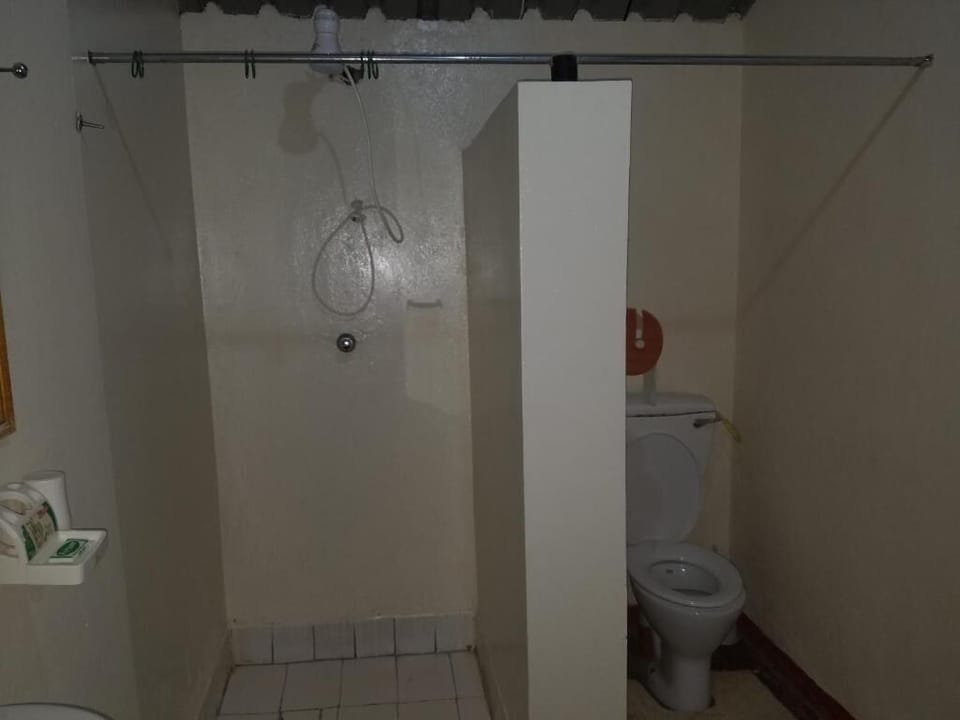 Shower, slippers, towels, soap