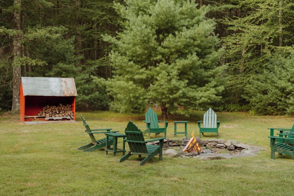 Nothing says a private getaway to the country than Adirondack chairs around a firepit. Wood provided so you sit back and relax.