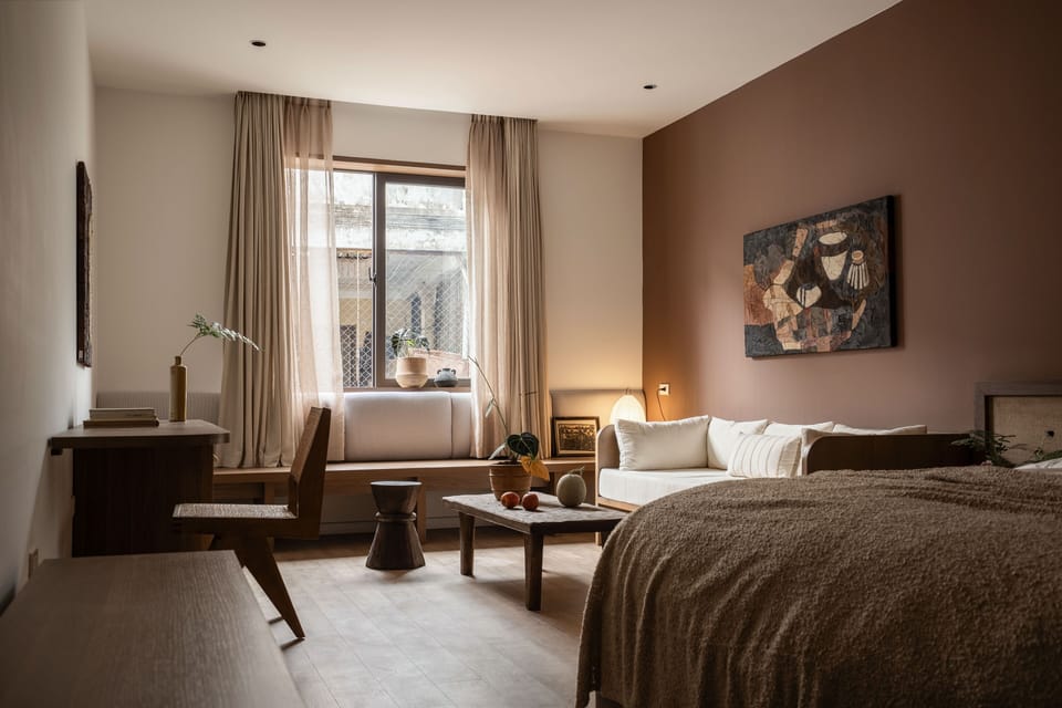 Deluxe Suite, City View | Desk, blackout drapes, iron/ironing board, free WiFi