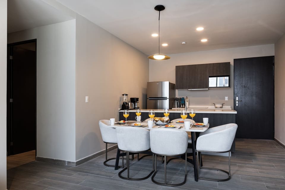 Dining area that connects seamlessly with the modern kitchen.