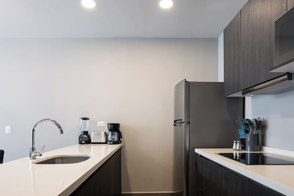 Enjoy the convenience of a modern kitchen, fully equipped for your daily cooking needs.