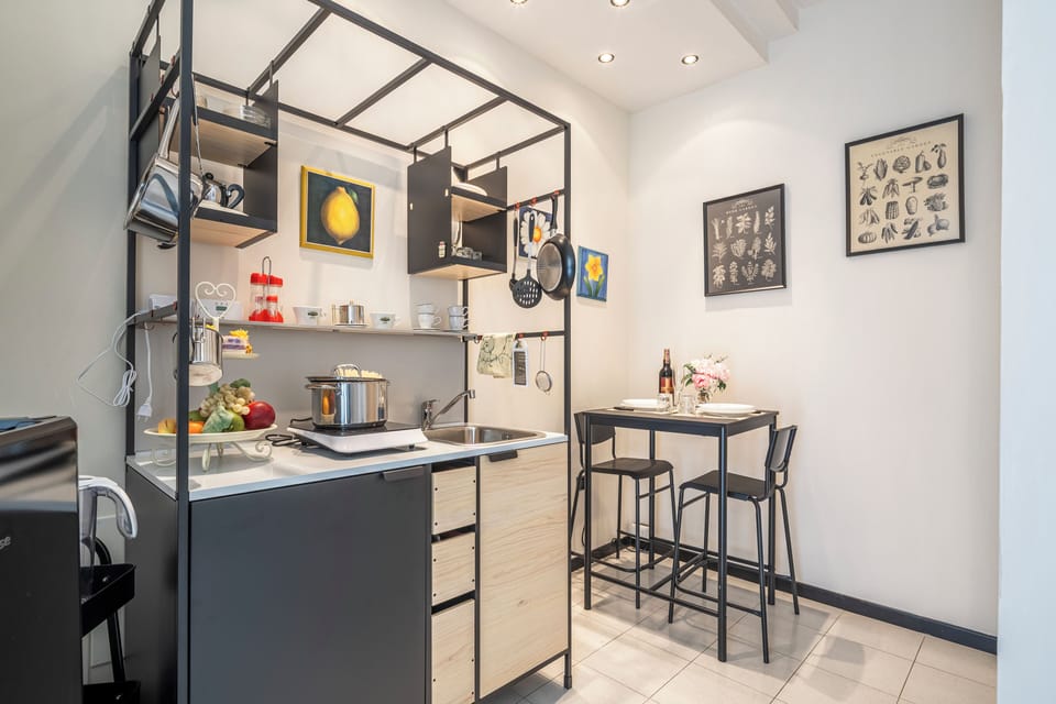 Apartment | Private kitchen | Fridge, stovetop, espresso maker, cookware/dishes/utensils