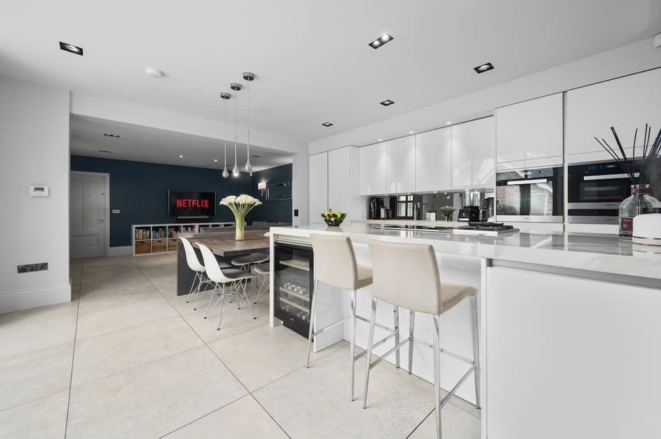 The heart of the home, a stunning kitchen and sitting area where everyone gathers