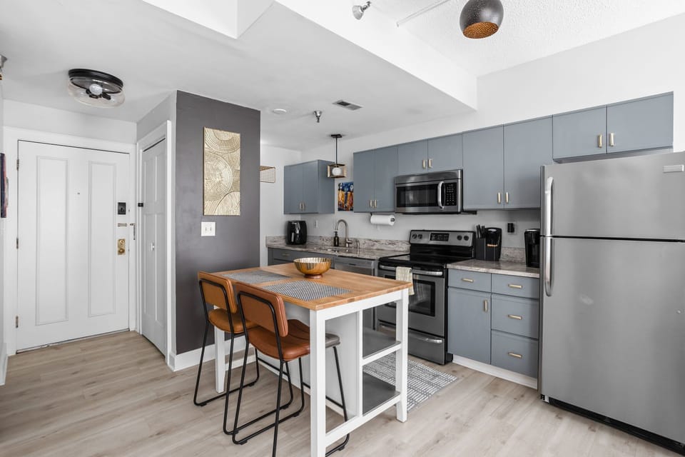 Warm and welcoming, this kitchen invites you to slow down, share a meal, and feel right at home—fully stocked with all the tools you need for simple, satisfying cooking.