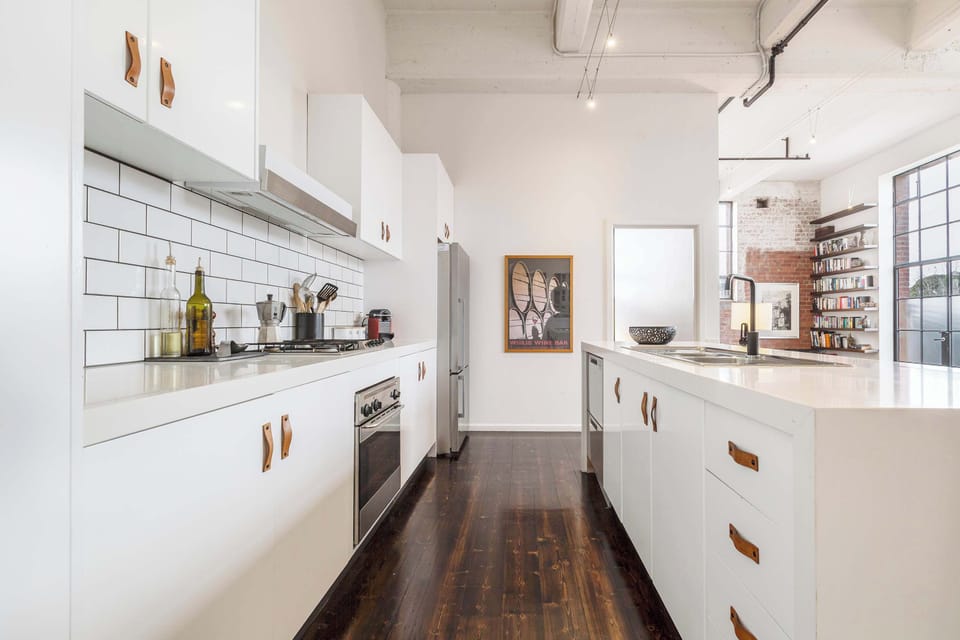 GALLEY KITCHEN: Fully equipped and ready for seasoned chefs or curious culinary explorers. Whatever your skill level, this kitchen is designed to make cooking a pleasure.