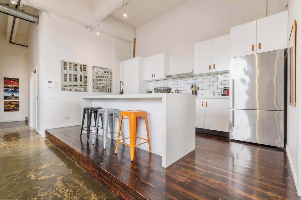 GALLEY KITCHEN: A crisp, elevated kitchen with everything you need to cook, connect, or sip coffee as the space gently comes to life around you.