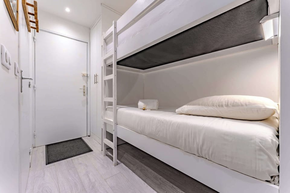 Comfy Sleeping Area with Soft Bunk Beds Perfect for families or friends—enjoy restful nights in cozy and clean beds.
