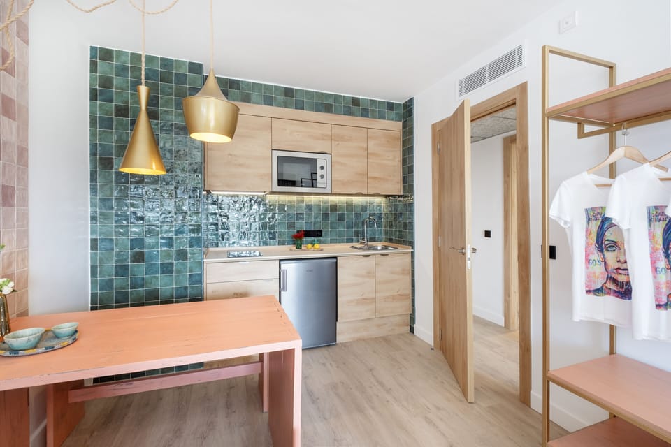 1 bedroom, laptop workspace, blackout drapes, iron/ironing board