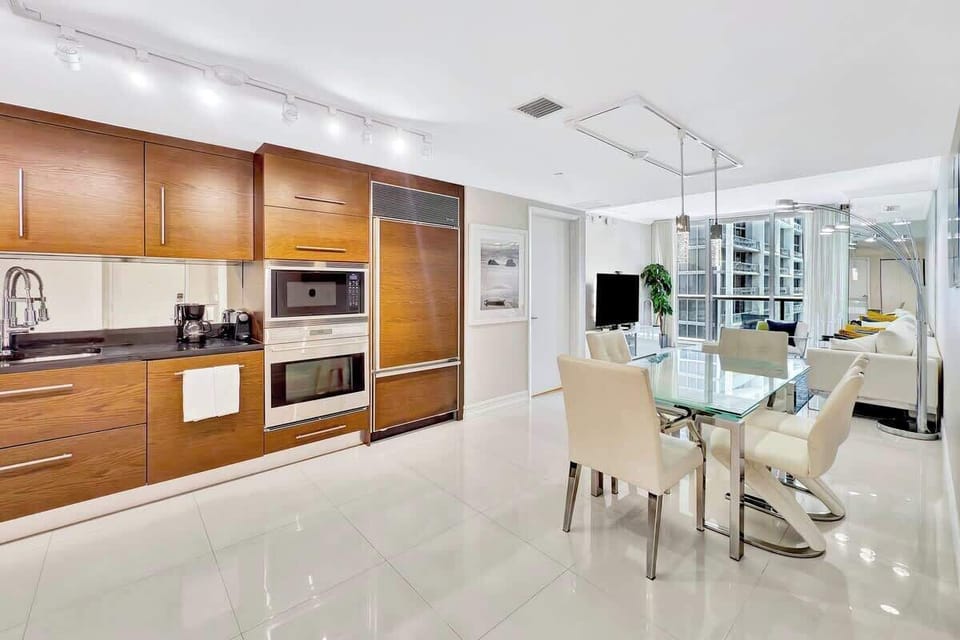 Chic dining space, perfect for a quiet meal, remote work, or a cozy breakfast.