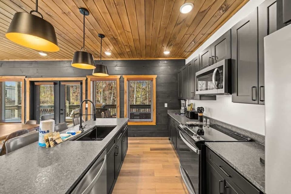 Fully stocked kitchen so you can cook and feed your group during your stay. (stove, oven, microwave, sink (no disposal), fridge, freezer, coffee machine, blender, can opener, toaster, cook/bakeware, silverware, dishes, cups, mugs, and wine glasses.