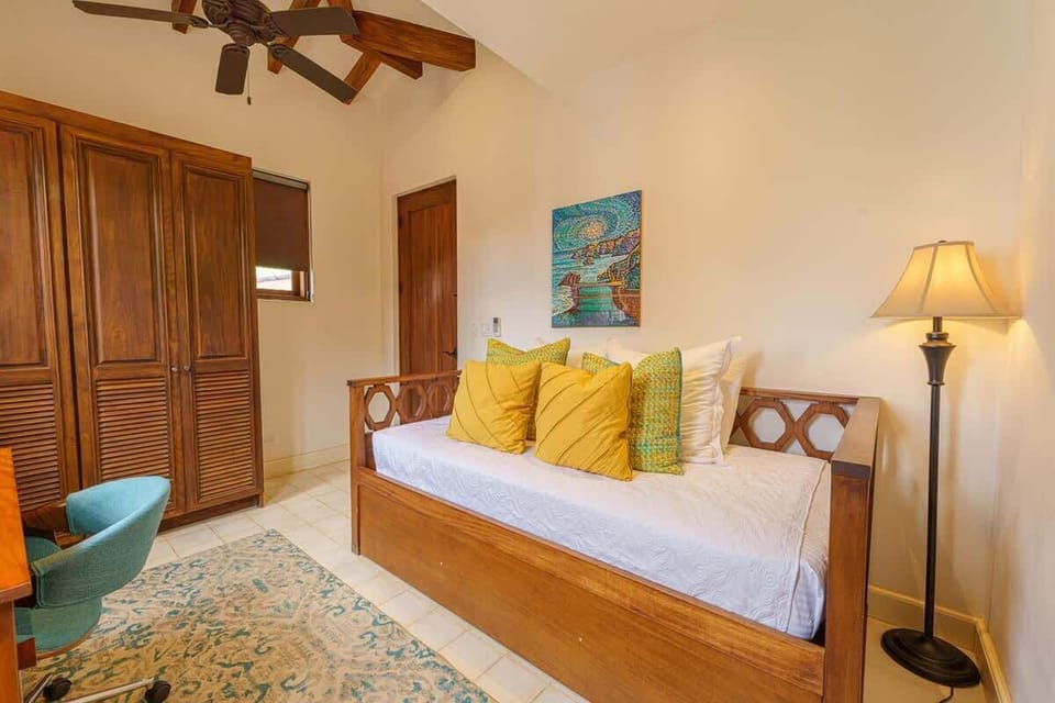 Guest bedroom with a single trundle bed