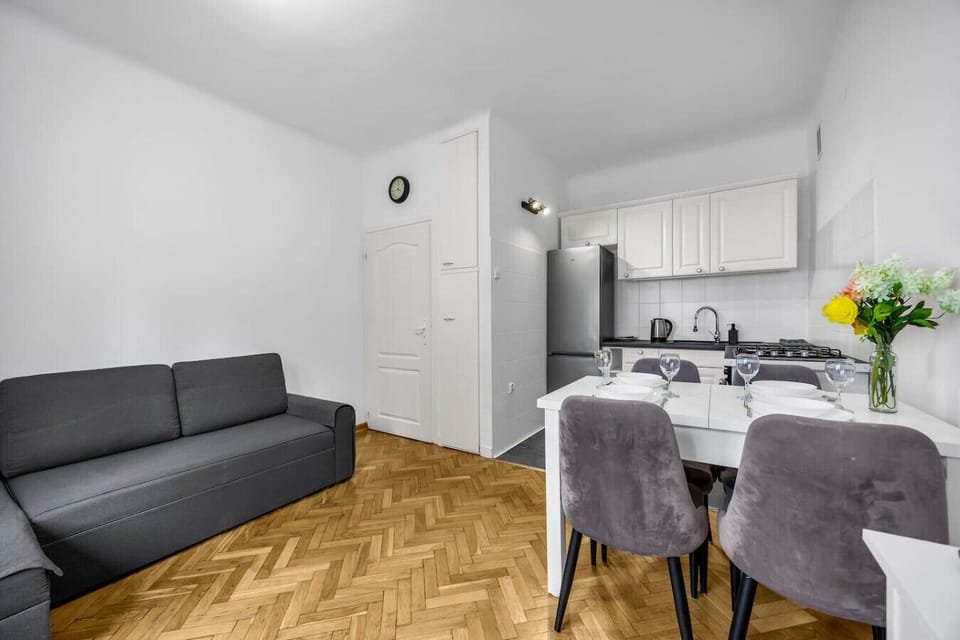 Living Room with Sofa Bed, Smart TV and Dining Table | Book Now with RENTUJEMY.COM