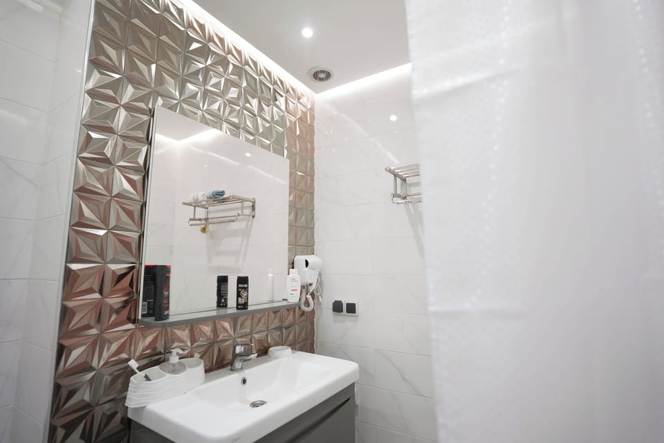 Luxury Apartment, Patio, Garden View | Bathroom | Free toiletries, bidet, towels, toilet paper