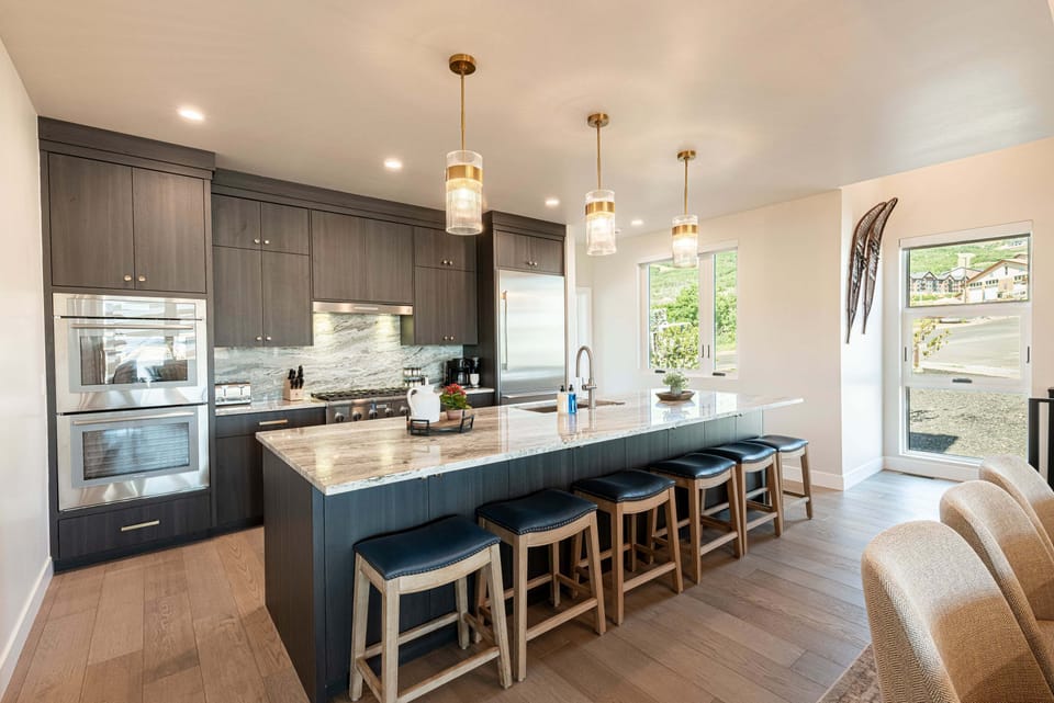Large center island with bar seating and cabinet storage