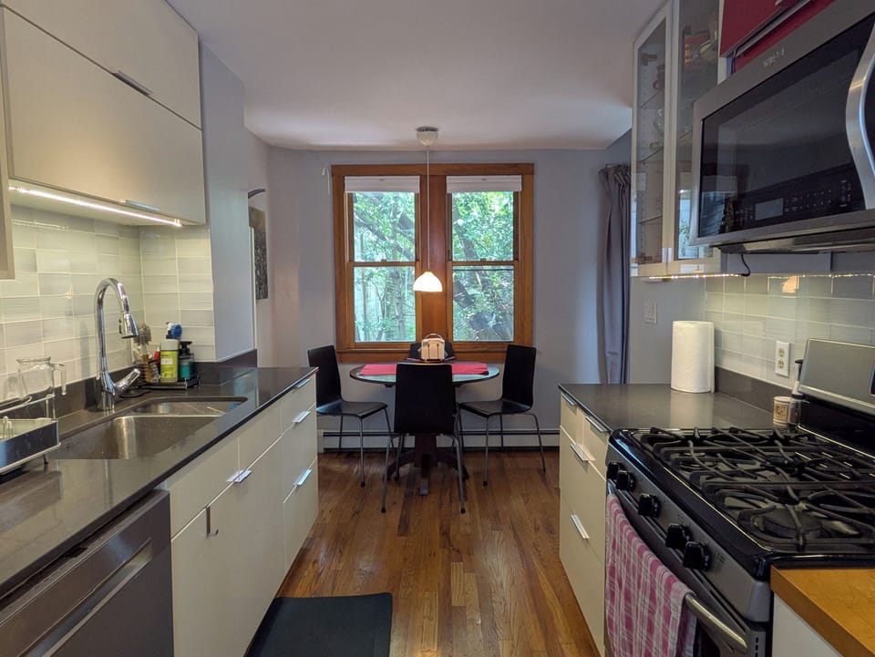 Eat-in kitchen seats four.