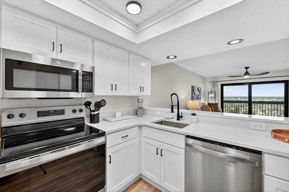 The fully equipped kitchen has everything you need to prepare delicious meals during your stay
