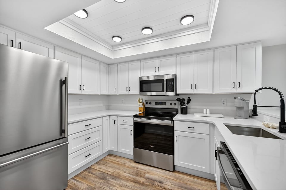 Cook in style in the updated kitchen featuring sleek stainless steel appliances