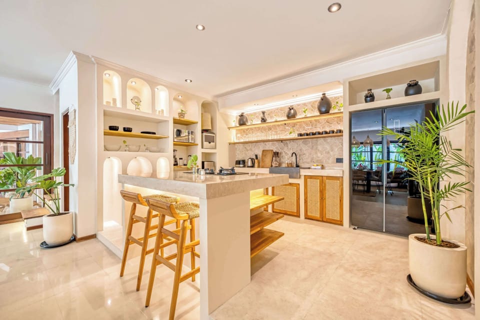Fully equipped modern kitchen with sleek finishes