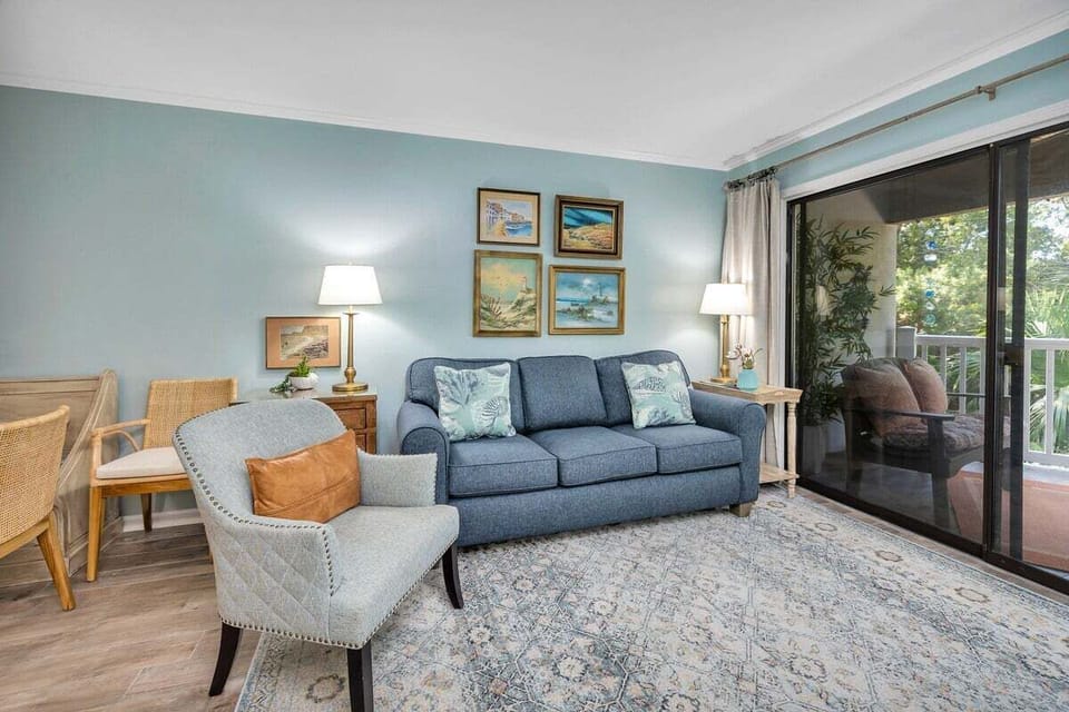 Shipwatch 106 - Living room area with couch and chair