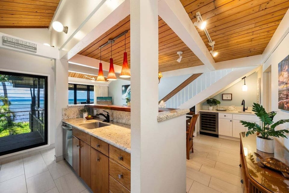 Spacious kitchen with plenty of counter space and a seamless flow into the dining area