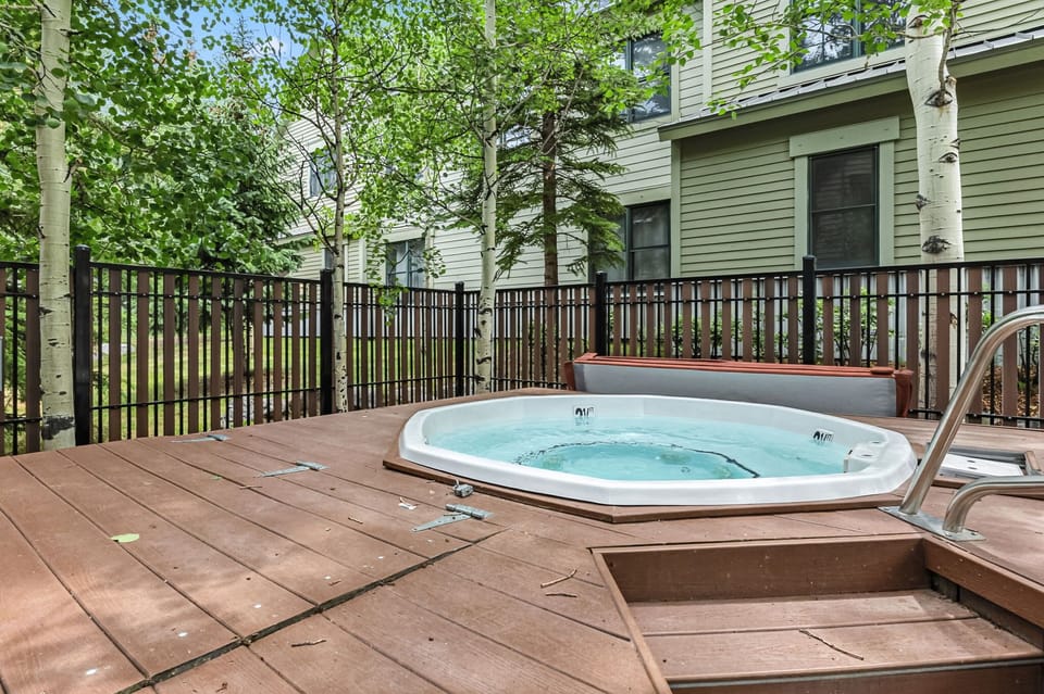 Hot tub: Shared 5-person hot tub steps away from unit