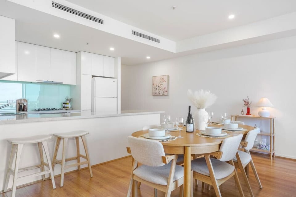Enjoy home-cooked meals or a local takeaway at your dining table, with a fully equipped kitchen just steps away.