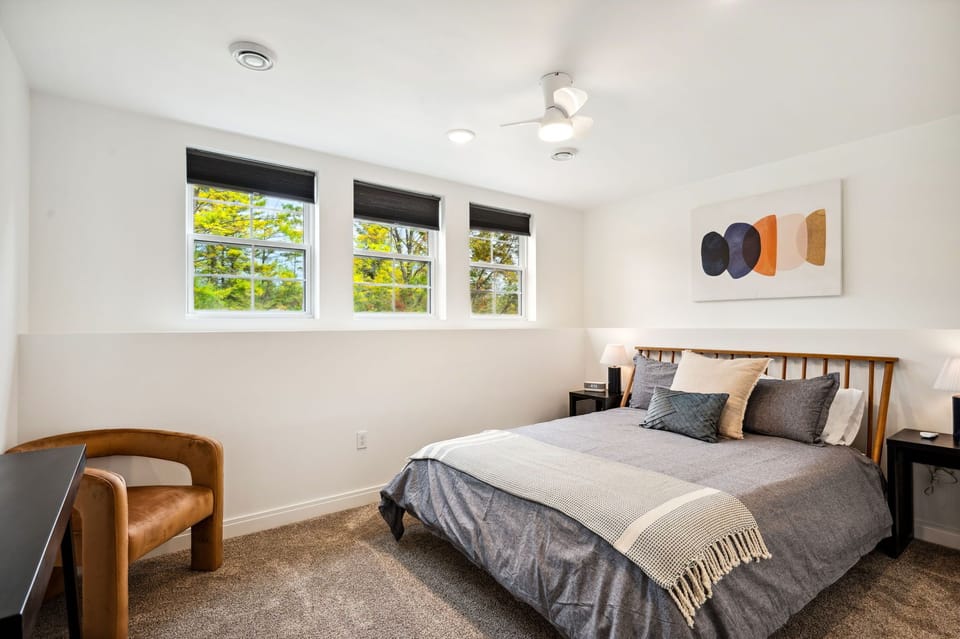 Settle into soft bedding in this serene, calming space.