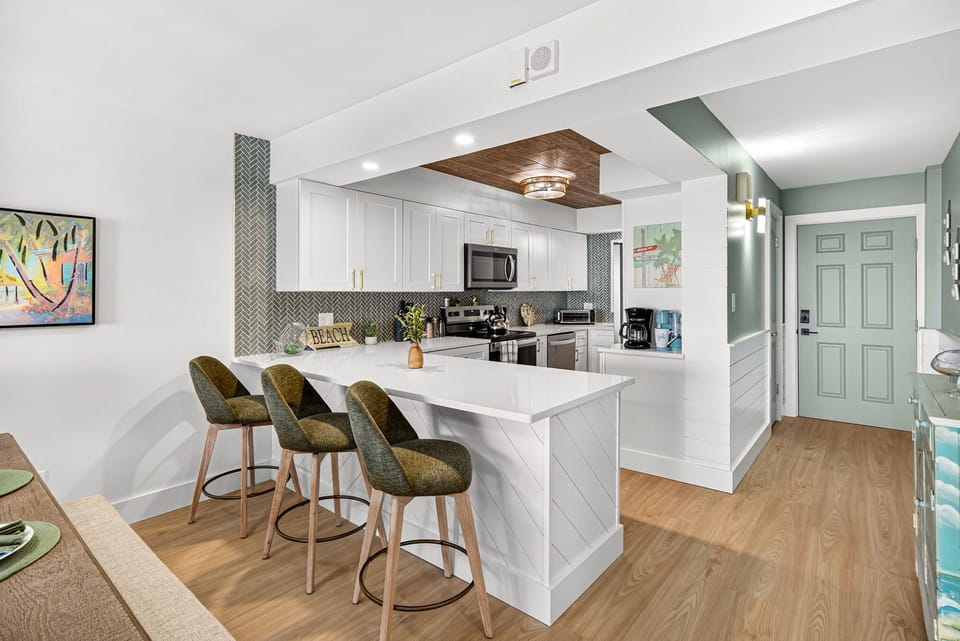 Enjoy the convenient breakfast bar with bar seating, perfect for coffee, quick meals, and gathering after a beach day. This updated beachfront 2-bedroom, 2-bath condo at Regency Towers is located at one of the most beloved resorts in Panama City Beach.