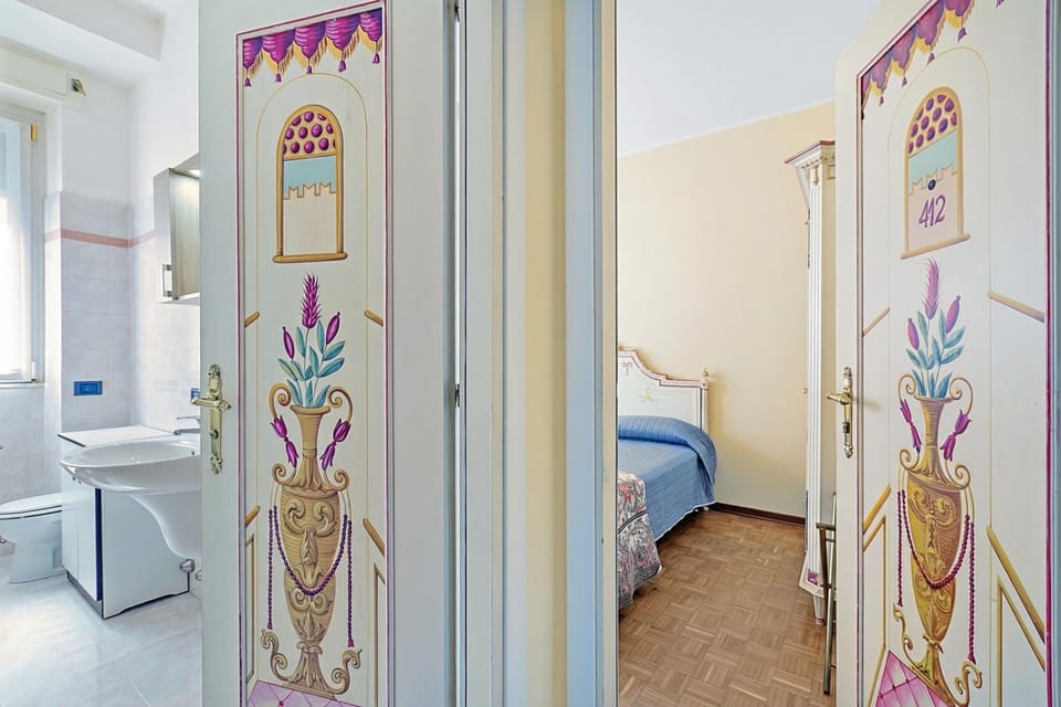 Family Apartment, 1 Bedroom, Air conditioning (Strixia Apartment Stresa 50m From) | 1 bedroom, free WiFi, bed sheets