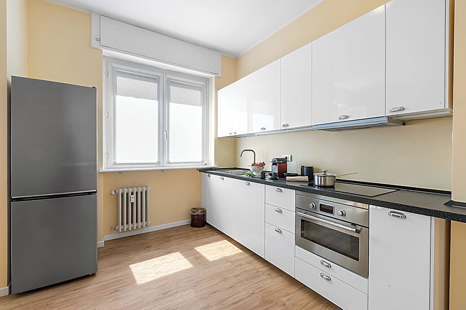 Family Apartment, 1 Bedroom, Air conditioning (Strixia Apartment Stresa 50m From) | Private kitchen | Fridge, oven, stovetop, dishwasher