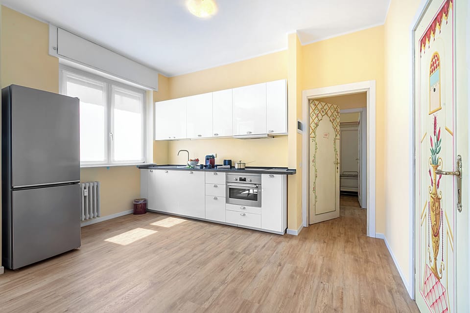 Family Apartment, 1 Bedroom, Air conditioning (Strixia Apartment Stresa 50m From) | Private kitchen | Fridge, oven, stovetop, dishwasher